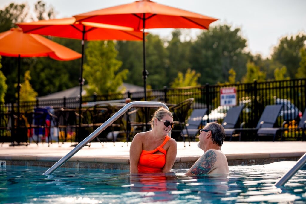 Explore the Amentities at Motorcoach Resort by lounging by the pool with your loved one in the nice ohio summer weather